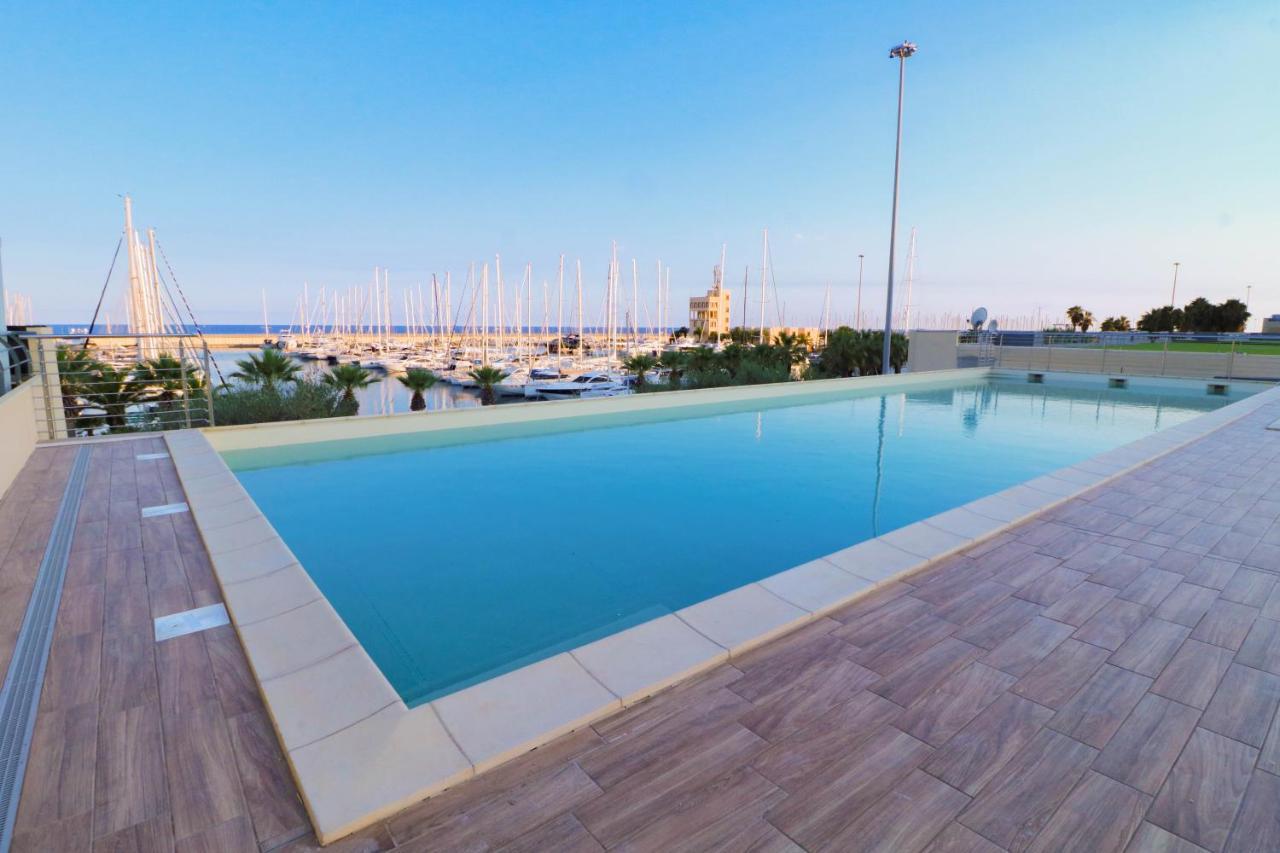 H11 Luxury 9A - Porto - Piscina - Jacuzzi Apartment Santo Stefano al Mare Bagian luar foto