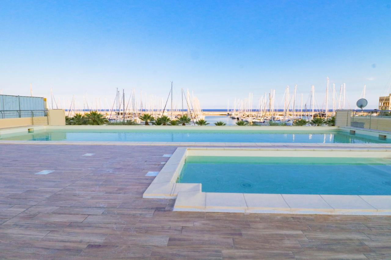 H11 Luxury 9A - Porto - Piscina - Jacuzzi Apartment Santo Stefano al Mare Bagian luar foto
